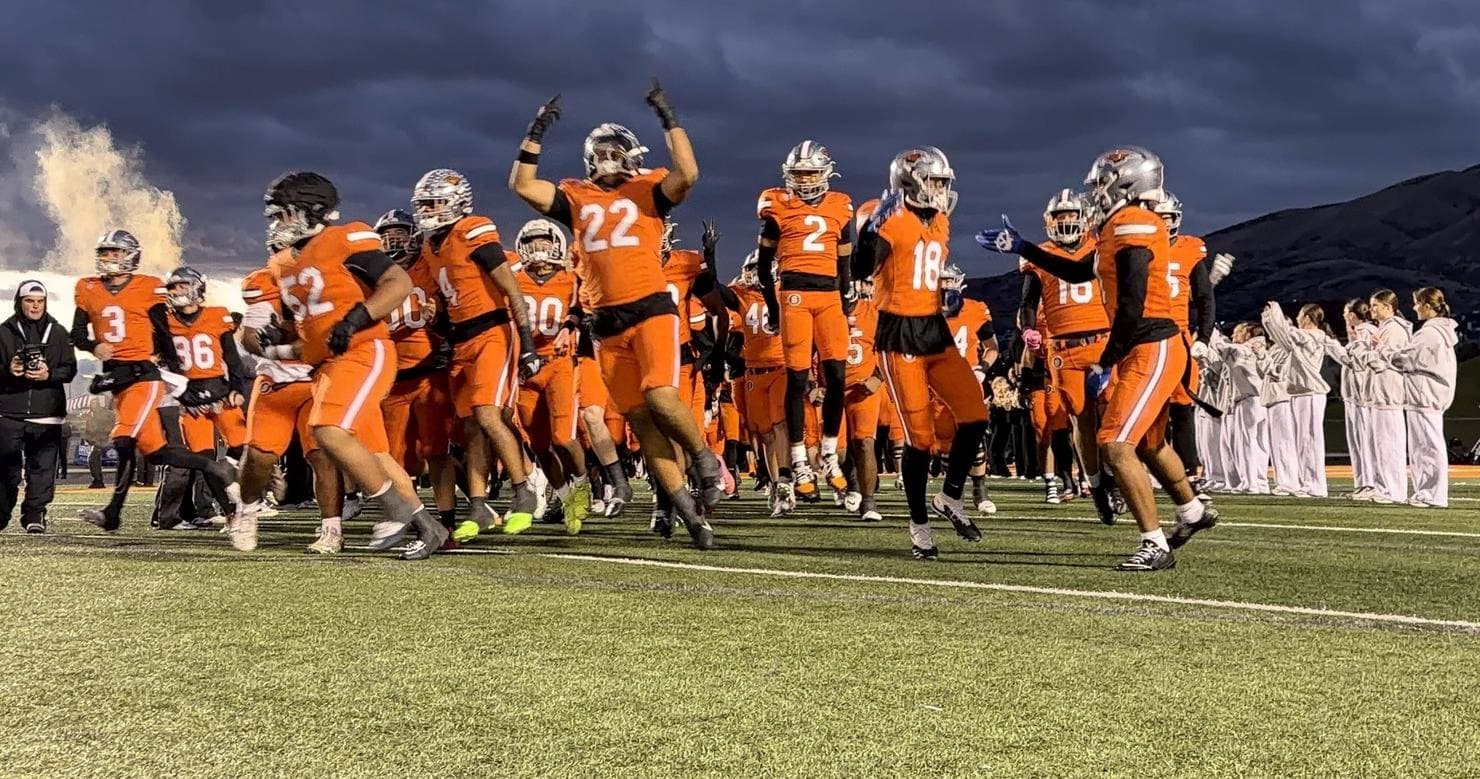 Skyridge players run onto the field before the 21-15 win over American Fork at Skyridge High School in Lehi on October 14, 2026.